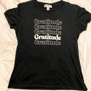 Suburban riot Tee. Worn once super comfy!